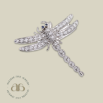 A Diamond And Sapphire Dragonfly Brooch By Tiffany & Co